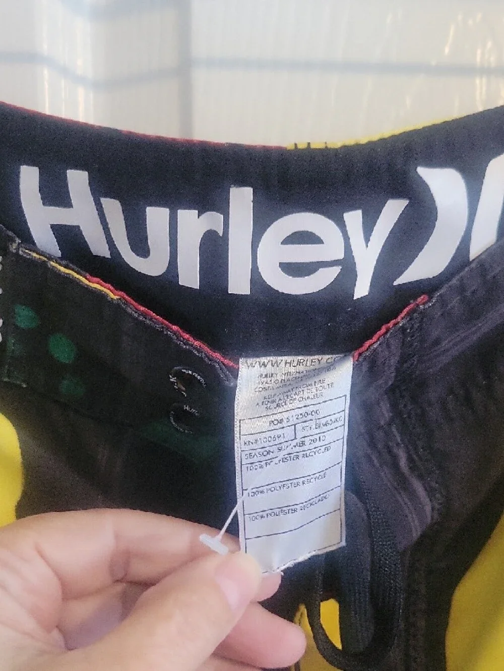 Hurley Black Swim Board Shorts with Yellow & Red Floral drawstring at waist